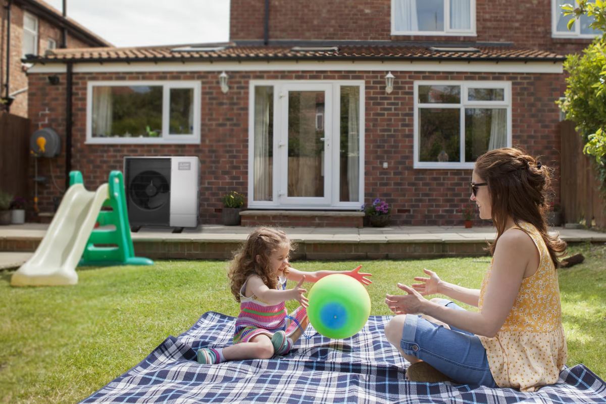 A family enjoying an ultra-quiet Ecodan heat pump at home